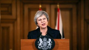 May defends Brexit deal