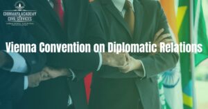 In the background of International flags the diplomats joining hands in the faceless picture